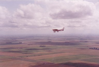 plane flying over iowa